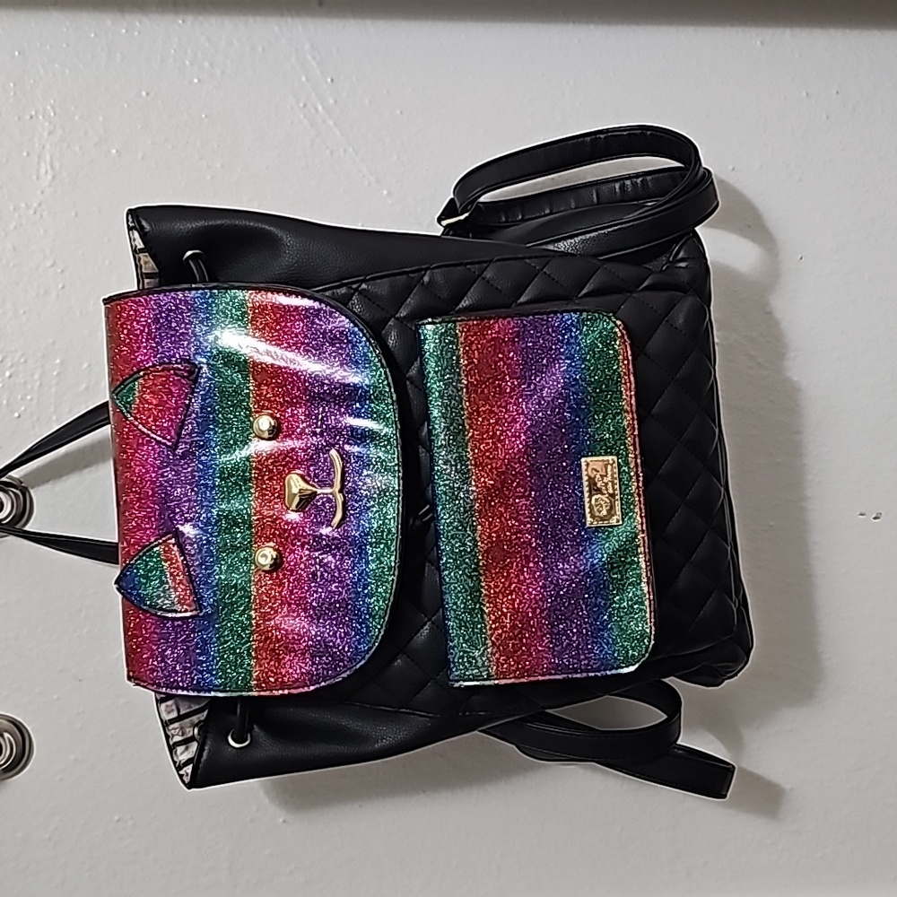 Luv Betsy by Betsy Johnson rainbow kitty back pack. Glitter 14 inches across.